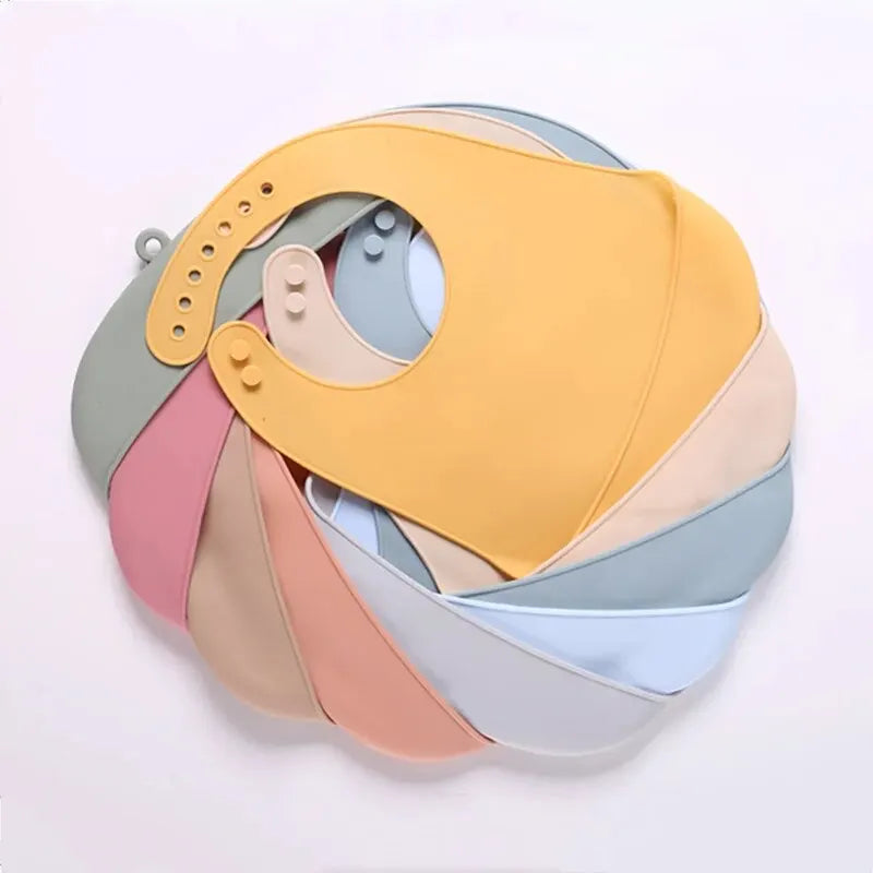 Silicone Baby Bib — Waterproof Roll-Up Bib with Crumb Catcher | 6M+ - photo 1