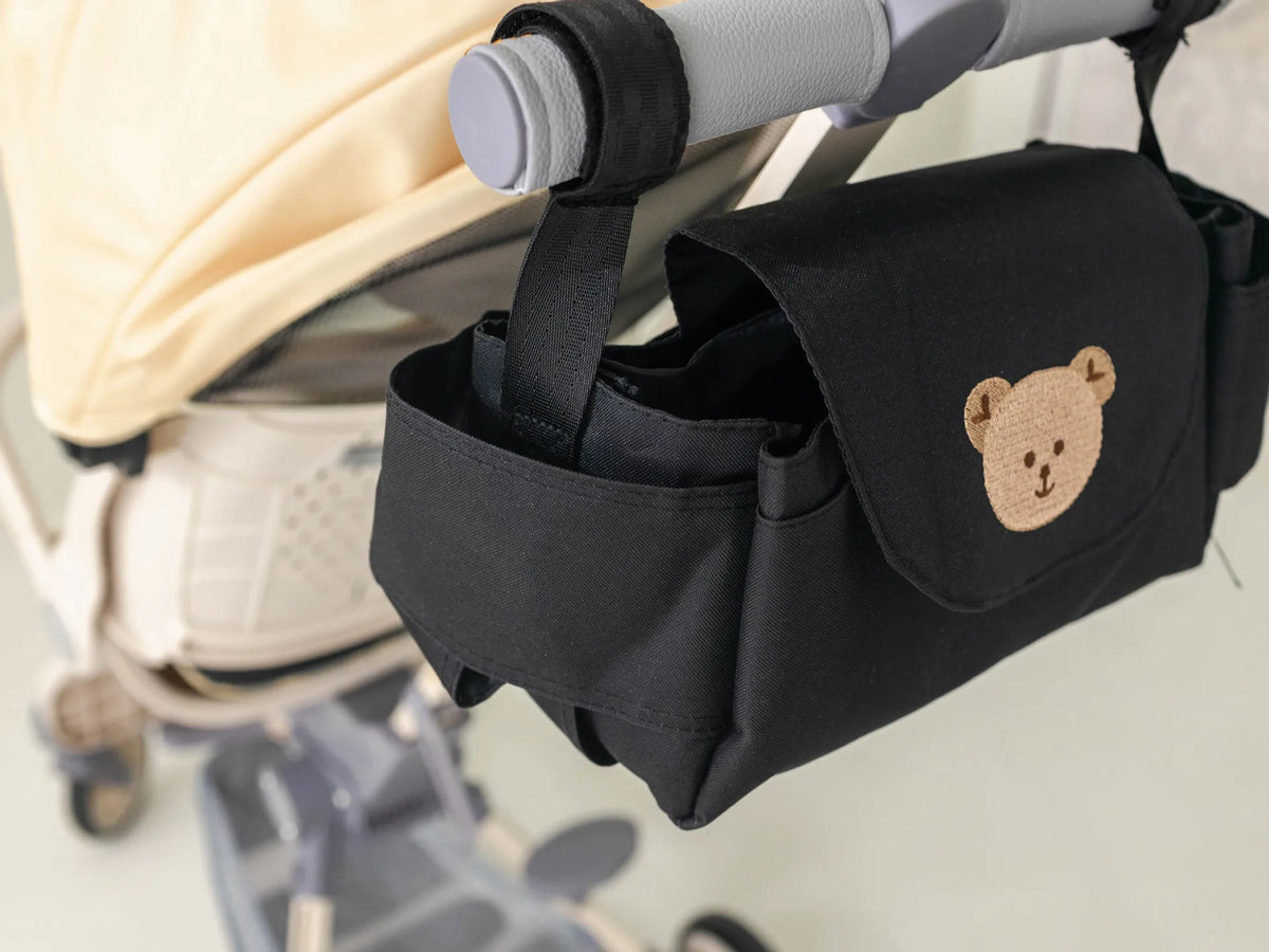 Stroller organizer bag attached to a pushchair handlebar