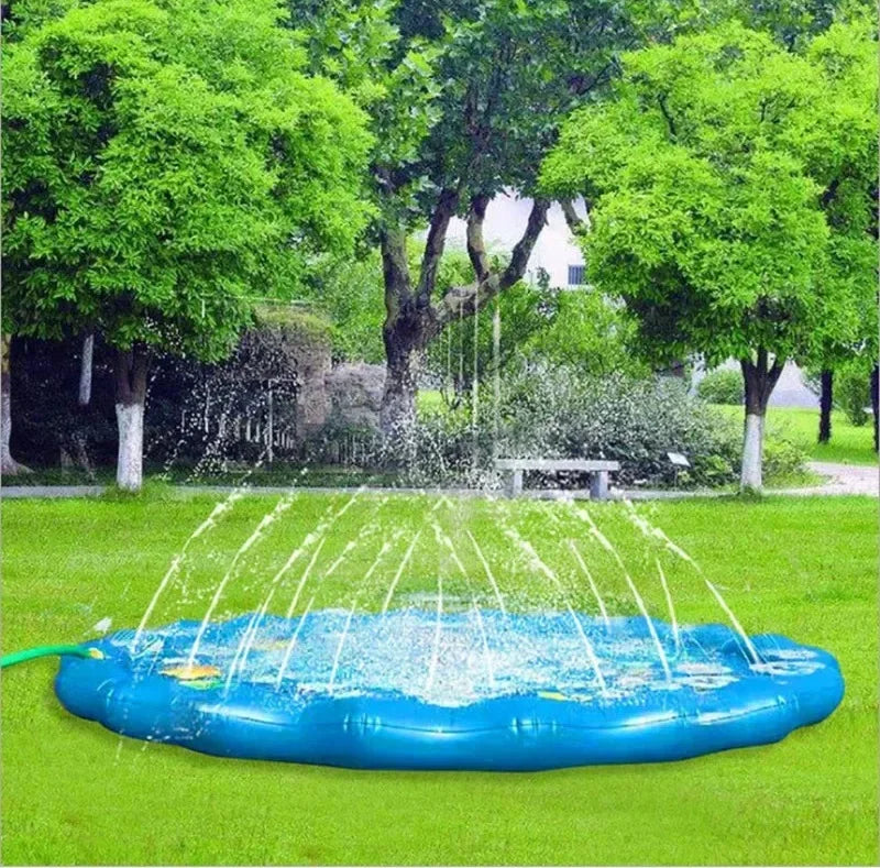 Inflatable sprinkler splash pad spraying water in a garden