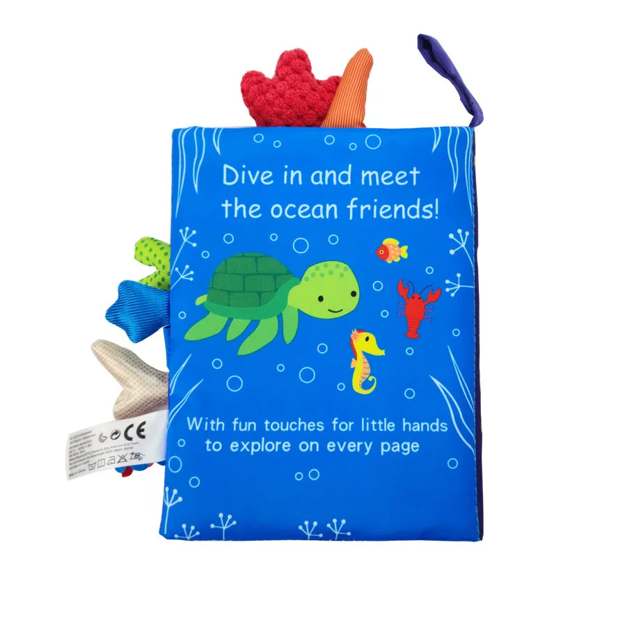 Baby cloth activity book with crinkle pages and rattle